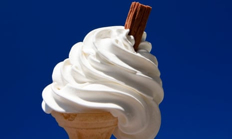 Vanilla ice-cream in a cone with a flake