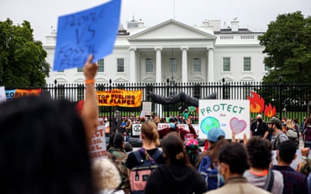 Protesters in October 2021 demanding that the Biden administration to do more to curb climate change and ban fossil fuels.