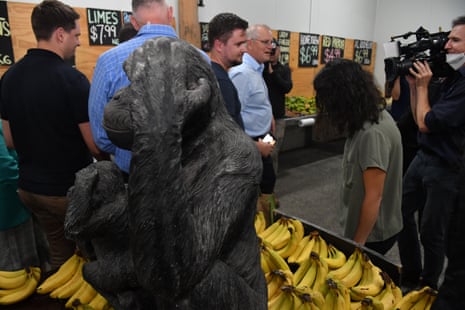 Prime minister’s office staff block prime minister Scott Morrison from photographers during a visit to Doblo’s Fruit Market in Rockhampton.