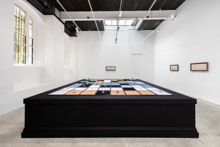 A large block table with shapes and sculptures on it.