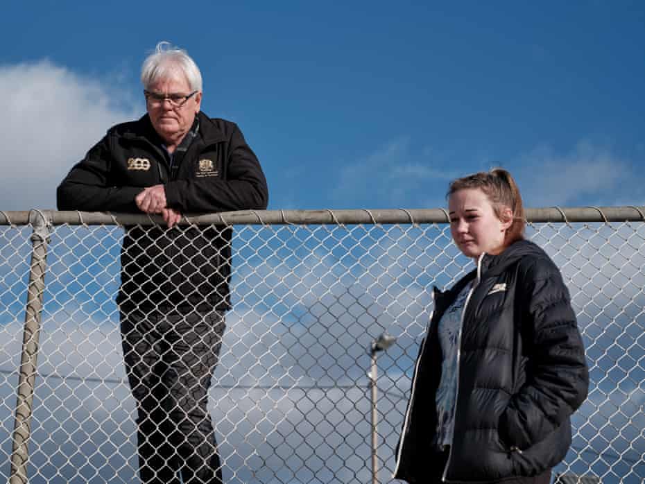 Scott Gadd, manager of the Hobart showgrounds, and Hannah, who lives at the showgrounds in a tent with her partner as the rental crisis in Hobart forces people to sleep outdoors in winter