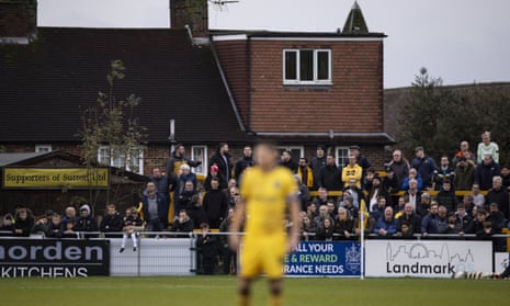 Sutton fans support their side against Tranmere.