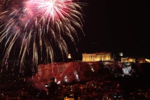 Fireworks illuminate the sky over the Parthenon in Athens, Greece