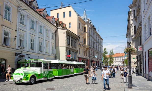 Eco green Environmentally-friendly circular tourist train ride on the Urban electric train in central Ljubljana Slovenia