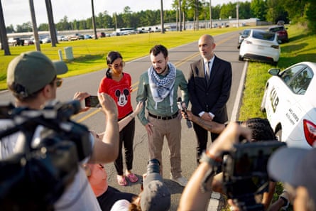 Man speaks to reporters