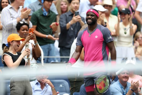 Frances Tiafoe, and the crowed, react after he won the third set against Alex Michelsen.