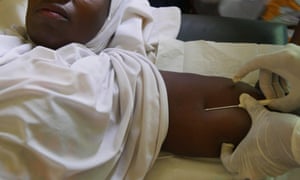 Sakina Sani, a mother of two, receives a contraceptive implant