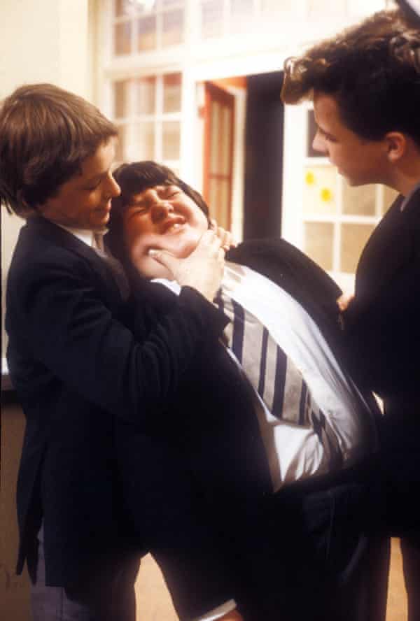 David Cameron’s favourite character … Gripper Stebson (Mark Savage) bullies Roland (Erkan Mustafa) in Grange Hill.