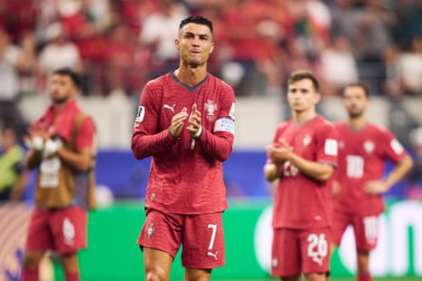 Cristiano Ronaldo of Portugal applauds the fans after defeat by Spain.