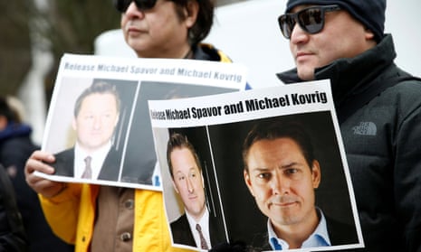 People in Vancouver calling for China to release Canadians Michael Spavor and Michael Kovrig, who were arrested after Canada detained a Huawei boss.