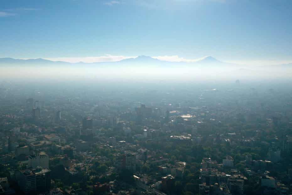 MEXICO-ENVIRONMENT-POLLUTIONAerial view showing low visibility due to air pollution in Mexico City, on January 1, 2021, during the COVID-19 coronavirus pandemic. (Photo by ALFREDO ESTRELLA / AFP) (Photo by ALFREDO ESTRELLA/AFP via Getty Images)