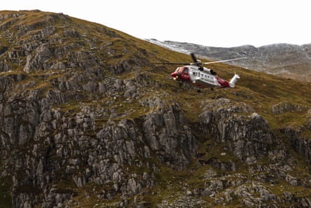 A search and rescue helicopter in the Snowdonia national park.