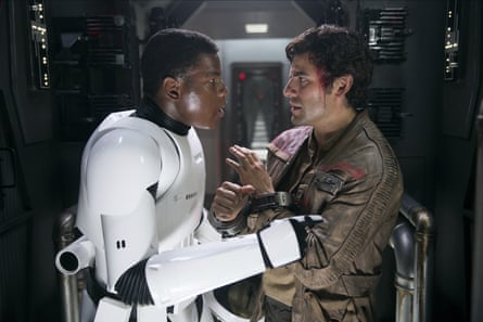 Boyega with Oscar Isaac in Star Wars: The Force Awakens, 2015…