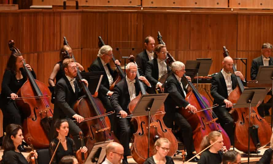the strings of the London Philharmonic Orchestra at the Royal Festival Hall.