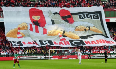 Spartak Moscow fans hold a giant banner during a game against Lokomotiv Moscow.