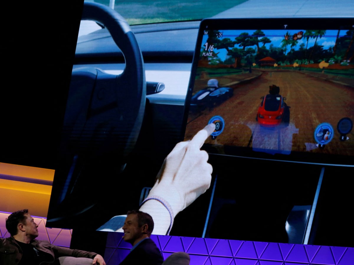 Us Investigates Claim Tesla Drivers Can Play Video Games While Driving Tesla The Guardian Us Investigates Claim Tesla Drivers Can Play Video Games While Driving Tesla The Guardian