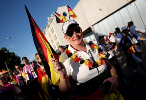 Fans arrive at the stadium