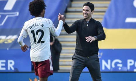 Mikel Arteta (right) celebrates with Willian after Arsenal beat Leicester at the King Power Stadium.