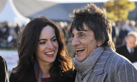 Ronnie and Sally Wood, who had twin girls in 2016. ‘The older a father is, the richer he’s likely to be.’