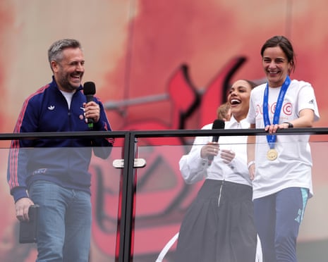 Arsenal head coach Renee Slegers speaks to the fans outside the Emirates.