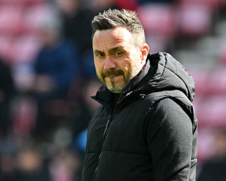 Roberto De Zerbi watches his players warm-up ahead of their Premier League fixture against Sunderland.