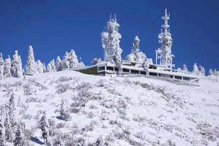 Ice covers communication towers as massive amounts of snow trap residents of mountain towns in San Bernardino county, California.