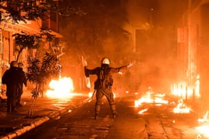 Athens, Greece: the aftermath of a petrol-bomb explosion during clashes between demonstrators and police following a rally commemorating the 1973 student uprising against the US-backed military junta