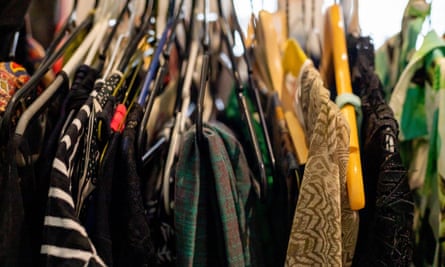 Clothes on hangers at a clothes swap party
