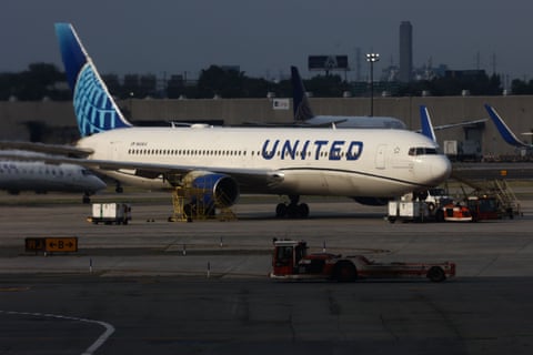 white jet with blue lettering