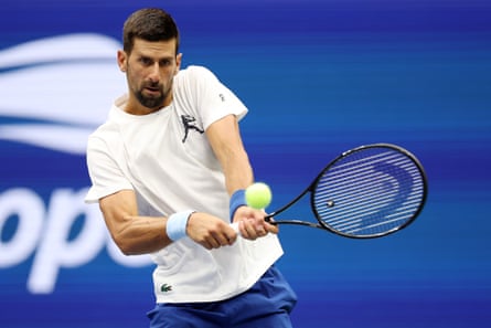 Novak Djokovic returns a ball during a practice session before the US Open.