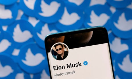 Illustration shows Elon Musk's Twitter profile on smartphone and printed Twitter logos