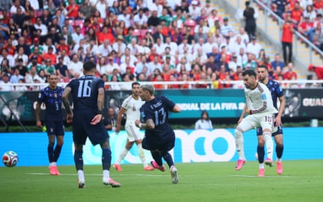 Alex Baena scores the opener for Spain.