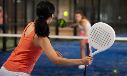 Padel, a cross between tennis and squash, is growing in popularity.