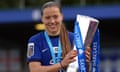 Chelsea's Fran Kirby celebrates with the FA Women's Super League trophy after clinching the title at Kingsmeadow in May 2021.