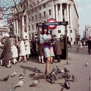 Drum cover model Marie Hallowi in Trafalgar Square, London, 1966.