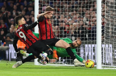 David Brooks (centre) prods the ball past Chelsea’s keeper Robert Sanchez to put Bournemouth ahead.