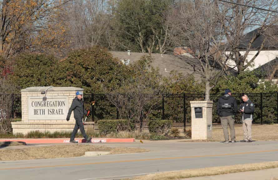 Law enforcement personnel continue the investigation to the hostage incident at Congregation Beth Israel Synagogue in Colleyville, Texas, on Sunday.