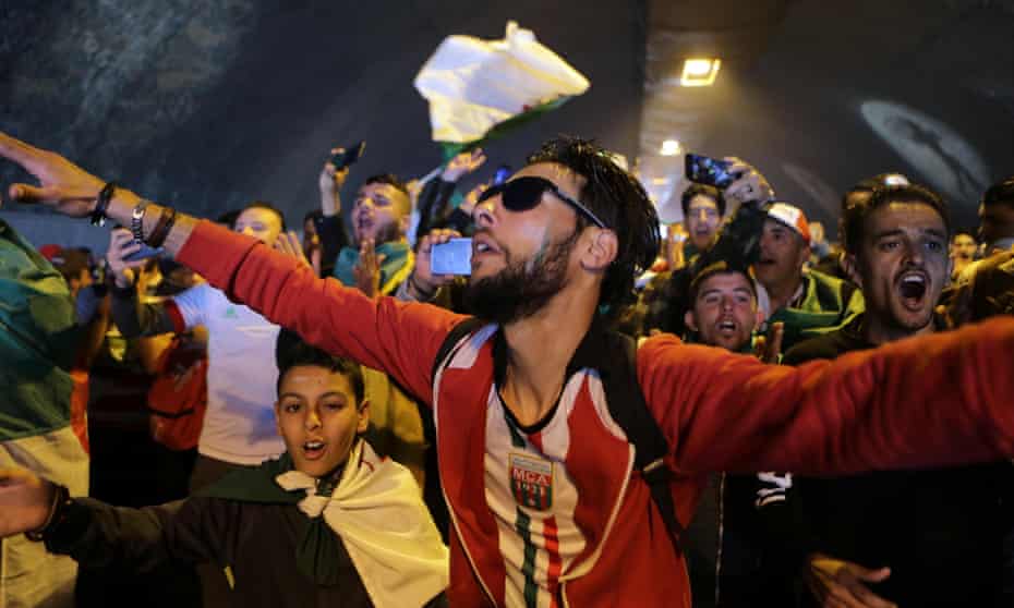 Algerians on a political demonstration in the street.