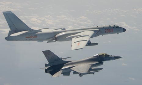 A Chinese H-6K bomber and a Taiwanese F-16 fighter