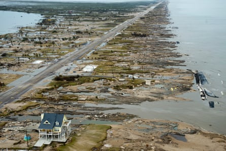 aerial view of one home among hurricane damage