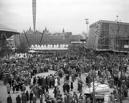 B/W photo of people with buildings on Southbank behind