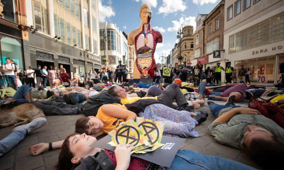 Extinction Rebellion protesters stage a ‘die in’ in Leeds.