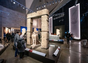 people viewing displays at Grand Egyptian Museum