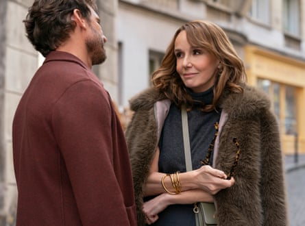 Philippine Leroy-Beaulieu as Sylvie Grateau and Arnaud Binard as Laurent in Emily in Paris