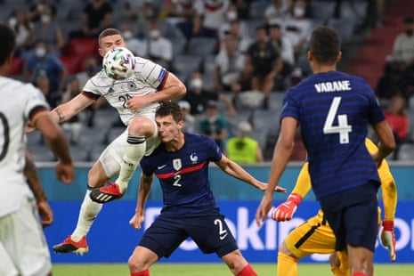 Germany’s defender Robin Gosens collides with France’s defender Benjamin Pavard.