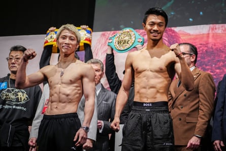 Naoya Inoue (left) and Junto Nakatani pose for photographs after Friday’s weigh-in in Tokyo.
