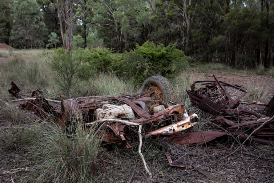 Colebee, NSW, Australia. A long abandoned vehicle in the Colebee Reserve. Colebee Reserve, in the suburb of Colebee near Marsden Park is surrounded on two sides by development that leads into vast estates.