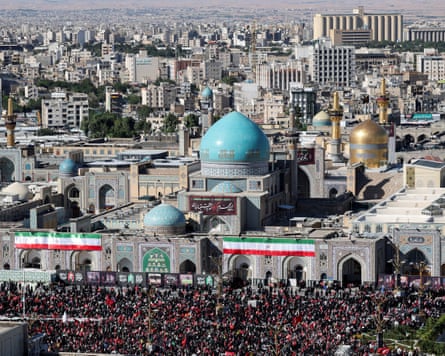 Mourners gather by Imam Reza shrine, on the day of the burial of Ayatollah Ali Khamenei.