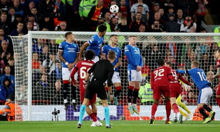 Trent Alexander-Arnold whips a free-kick over the wall and into the Rangers net
