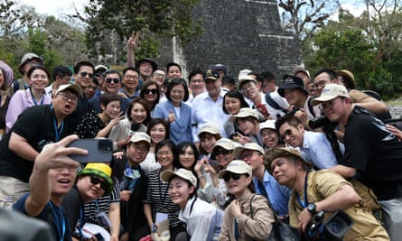 The presidents of Taiwan and Guatemala, Tsai Ing-wen and Alejandro Giammattei, with journalists at an archaeological site in Peten, Guatemala